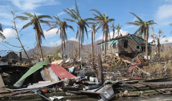 A colour photograph of storm damage in Taccloban, Philippines