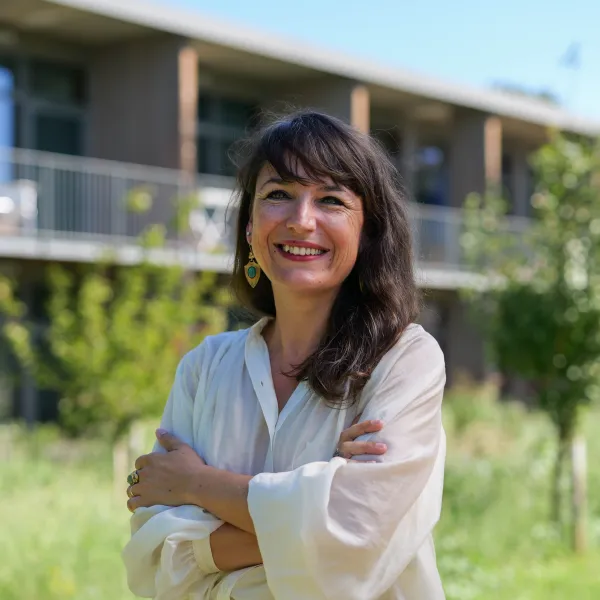Céline Ventura Teixeira in the Iméra garden in front of the Maison Neuve building
