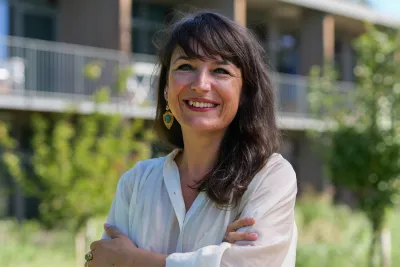 Céline Ventura Teixeira in the Iméra garden in front of the Maison Neuve building